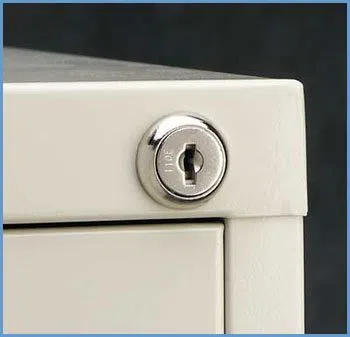 State Locksmith Services Raleigh, NC 919-887-2071 - 12-unlocking-file-cabinet